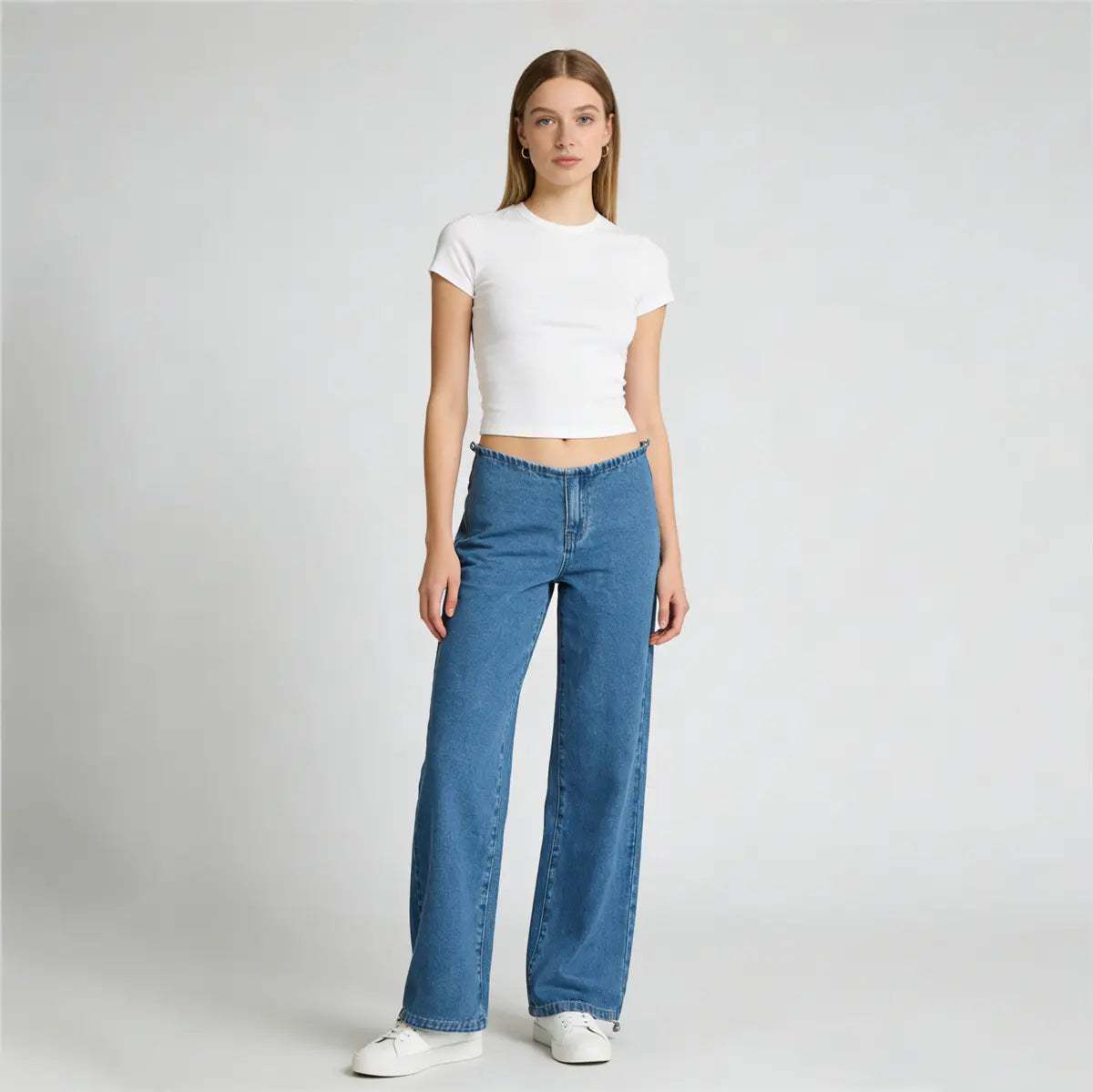 Step into bold street style with the Pwest NYC Low-Rise Wide-Leg Jeans, designed for fashion lovers who embrace the iconic Y2K aesthetic. Featuring a low-rise waist 